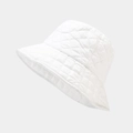 Detail view of white quilted bucket hat showing diamond stitching and warm puffy texture - One Size / White