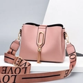 Pink bucket bag for women with tassel detail and a wide LOVE print shoulder strap - Pink