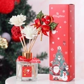 Christmas reed diffuser set in festive red gift box with floral sticks and ribbons - White Peach Oolong