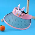 Pink and blue kids sun visor with cute white rabbit and UV-sensitive color changing brim - Color Changing Rabbit (1024) / Pink