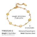 Détail du bracelet en acier doré 18 carats avec disques solaires et fermoir mousqueton - Or (YYB025145-G)