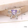 Detail view of silver bow charm with purple heart crystal and 1.9cm x 1.4cm dimensions - Heart Gem Bow Purple