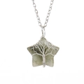 Detailed macro of handmade silver wire tree of life on star natural crystal pendant - Silver + Labradorite