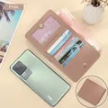 Pink lychee grain leather bifold wallet with RFID blocking and multiple card slots - Pink