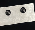 Minimalist black spherical stud earrings with a polished mirror finish on white card - Simple 10mm Black Ball