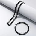 Titanium steel black Cuban link necklace and bracelet set displayed on a white stand - 6MM Black / Bracelet 20CM