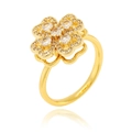 Detail view of a gold clover ring with clear rhinestones on white reflective background - Adjustable Open / Hollow Clover Style (J1501-F)