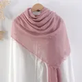 Dusty pink cotton linen scarf with pleated texture and frayed edges on white hanger - Dark Pink