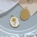Close-up of vintage rose charms with white enamel and pearl details for DIY jewelry - 1# Pearl White Shell