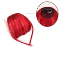 Detail view of a 13cm red air bangs hairpiece with secure black clip attachment - Red-101