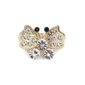 Macro detail of gold butterfly brooch with clear crystals and black rhinestone antennae - Butterfly (Style 4)