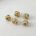 Detailed view of handmade 18K gold-plated cloisonne enamel hollow beads for DIY jewelry - 25# Hollow Bat 14mm / 1 Piece