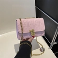 Pink embossed nylon shoulder bag with gold chain strap and elegant 8-shaped metal lock - Pink