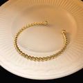 Adjustable gold plated titanium steel bangle with twisted rope texture and cubic zirconia - Twisted Rope Open Cuff Bracelet