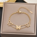 Double-layered golden stainless steel butterfly bracelet with matte and hollow charms - Gold Three Butterflies Double Chain (5261)