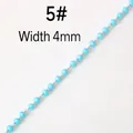 Macro detail of 4mm sky blue faceted crystal bead chain for DIY jewelry accessories - 4mm / 5# Light Blue Chain Per Meter