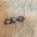 Chic rainbow hoop earrings with multi-colored cubic zirconia in polished silver - Millennial Ear Buckle Set of Four