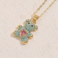 Golden bear pendant necklace with sky blue beads and a pink heart-shaped crystal - Earth Blue Heart Zircon
