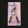 Silver eyelash curler with black handle in a pink gradient blister pack display - Chrome Curler with Comb Black Duckbill Handle Black Rubber Pad Blister Card Pack