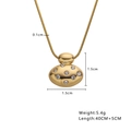 Detail view of gold heart pendant with dimensions 1.5cm by 1.5cm and thin chain - Dotted Oval Style (N399)