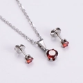 Classic silver necklace and stud earrings set featuring faceted red zircon stones - Red Zircon Round Set