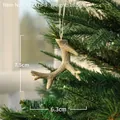 Golden glitter reindeer antler Christmas ornament hanging on a tree 7.5cm x 6.3cm - Small Champagne