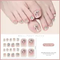 Macro shot of glittery nude pink gradient toe nail stickers with diamond crystal 3D accents - Multi-style Fashion Foot Nail Style (J23-16) / 10.8*5.8cm
