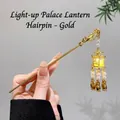 Golden Chinese hair pin with glowing palace lantern and pearl tassels on hand - 110# Palace Lantern LED - Gold