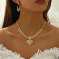 Close-up of sparkling heart rhinestone fringe necklace and earring bridal jewelry set - Gold 196-Heart Pendant