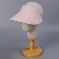 Pink wide brim sun visor hat for women with minimalist sporty design on display stand - M (56-58cm) / Pink