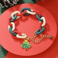 Detailed macro view of red and green Christmas chain bracelet with a green tree pendant - D1051 (Chunky Chain Xmas Tree)