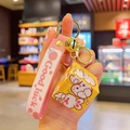 Cartoon Rubik's cube keychain with yellow rabbit design and pink Good Luck strap - Cute Rabbit Magic Cube / Pink
