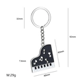 Black and white piano shaped enamel keychain with musical notes and rhinestones - Piano Style / Black