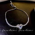 Adjustable silver heart crystal bracelet with sparkling diamonds and pull closure - Super Flash Zirconia Heart Slider Bracelet