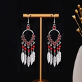 Bohemian silver drop earrings with red beads and hanging metal feathers - Red Beaded Feather Tassel Style (E5220)