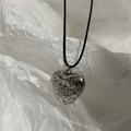 Vintage heart pendant necklace with carved patterns on black wax cord in silver finish - Black and Silver Heart Style