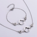 Set di gioielli a quadrifoglio in argento con collana in zircone e bracciale charms - Set Gioielli d'Argento