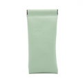 Detail view of mint green PU leather pouch with internal metal spring closure system - Matcha Green