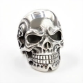 Vintage hip hop skull ring in polished silver stainless steel for men on white background - US 7 / Steel