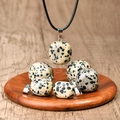 Dalmatian stone pendant on black leather cord necklace with irregular pebble shape - Dalmatian Jasper