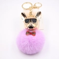 Dettaglio del portachiavi Bulldog francese con pompon viola e fiocco decorativo - viola taro