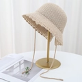 Beige knit bow lace bucket hat with hollow wavy brim design for summer outdoor travel - Beige