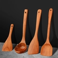 4-piece natural red-brown wooden kitchen utensil set with hanging holes on black background - 4-Piece Family Utensil Set