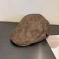Detailed close-up of dark brown PU leather newsboy cap showing fine stitching and texture - M (56-59cm) / Khaki