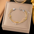 Three-tone beaded bracelet in gold, silver, and rose gold with sleek snake chain and S-STEEL - Triple Layer Bead Tricolor