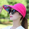 Detail of rose red sun visor with tropical floral lining and wide protective brim - Plain Leaf Style / Rose Red