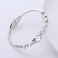 Bracciale rigido argento traforato con chiusura in cristallo e dettagli circolari incisi - Color Acciaio