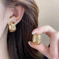 Boucles d'oreilles créoles dorées en U avec texture matelassée et fini poli - 91# Tige en Argent - Boucles d'Oreilles en U Matelassées Haute Brillance Dorées