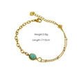 Detail of adjustable star charm bracelet with natural turquoise and dual gold chains - Amazonite Bracelet