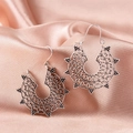Vintage silver bohemian drop earrings featuring intricate hollow patterns and black dots - Antique Silver (4072)